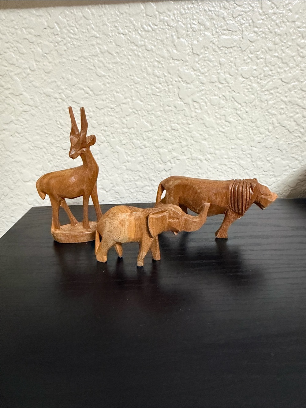 3 vintage hand-carved wooden African animals (lion has a broken foot)